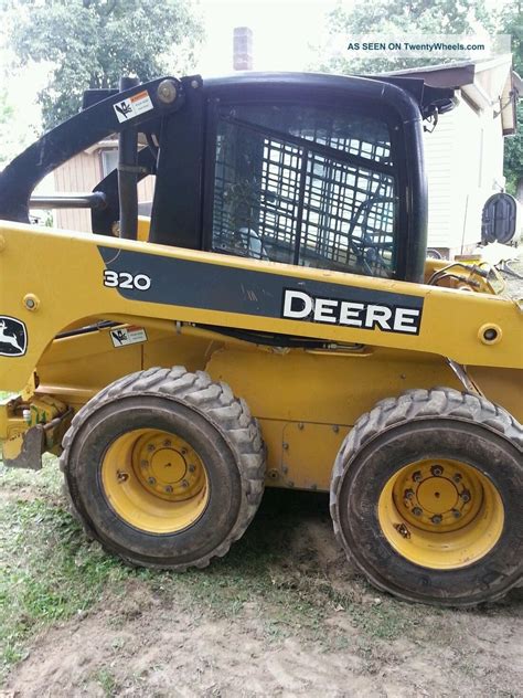 cat 320 skid steer|john deere 320 loader specs.